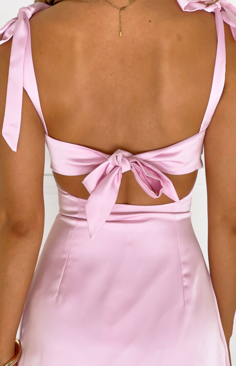 Minivestido rosa con lazo y corte alto de Akira - PRE-ORDEN