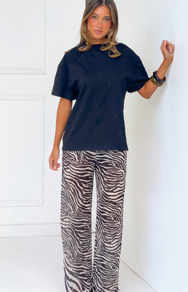 Pantalones negros transparentes con estampado de cebra Joplin - PRE-ORDEN