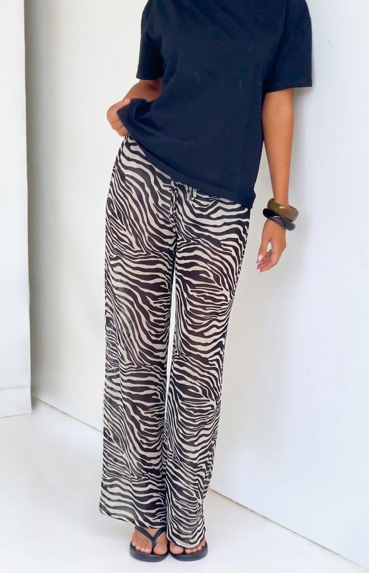 Pantalones negros transparentes con estampado de cebra Joplin - PRE-ORDEN