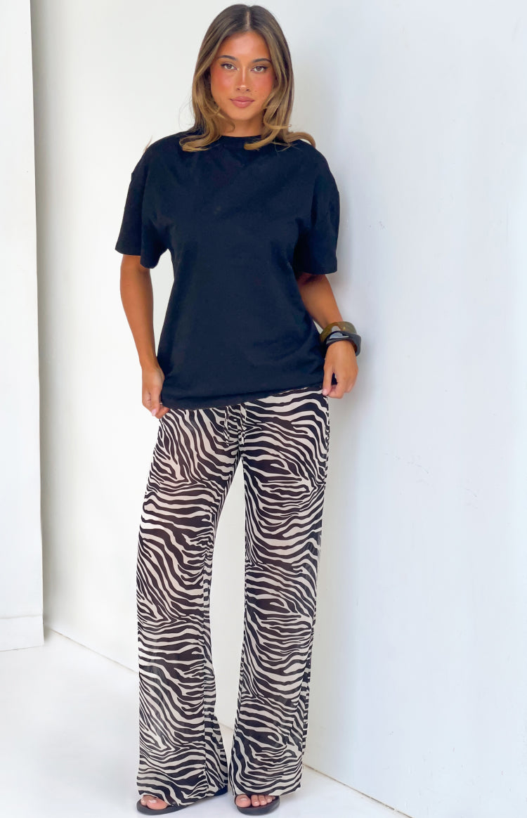 Pantalones negros transparentes con estampado de cebra Joplin - PRE-ORDEN